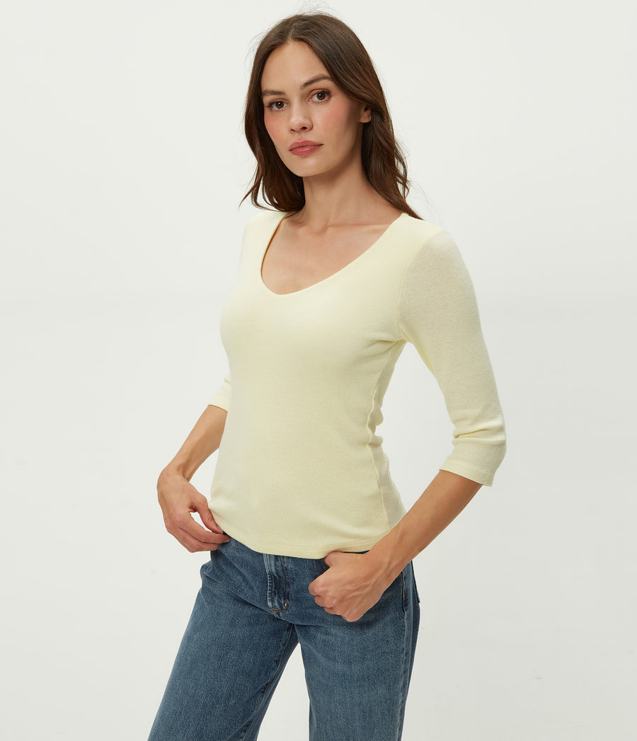 Angelina Shine V-Neck Tee in CUSTARD Yellow Close Up View #CUSTARD