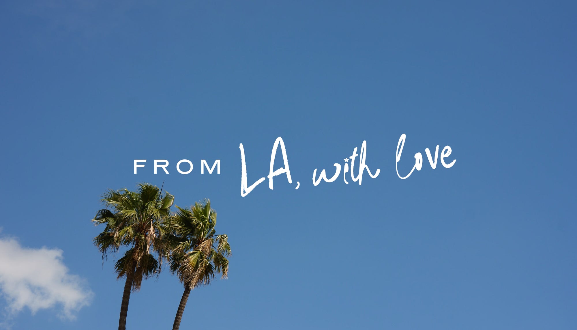 Image of blue sky with a cloud and palm trees with text "From LA, with love" overlayed