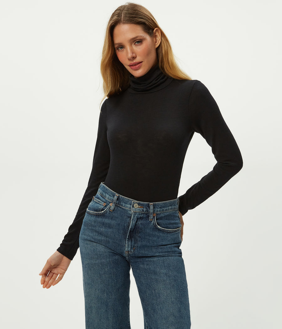 Jojo Side Ruched Turtleneck in Black Close up View #BLACK