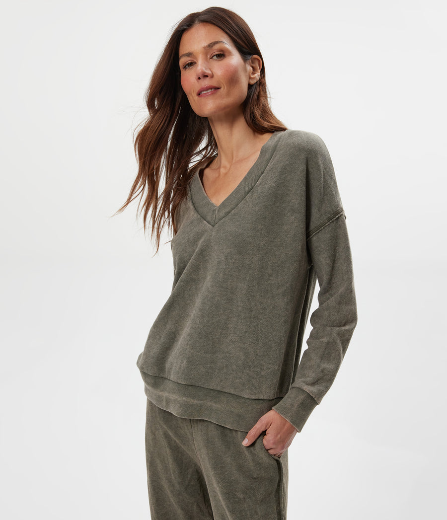 Tibby V-Neck Sweatshirt in CAPER Green Close up View #CAPER