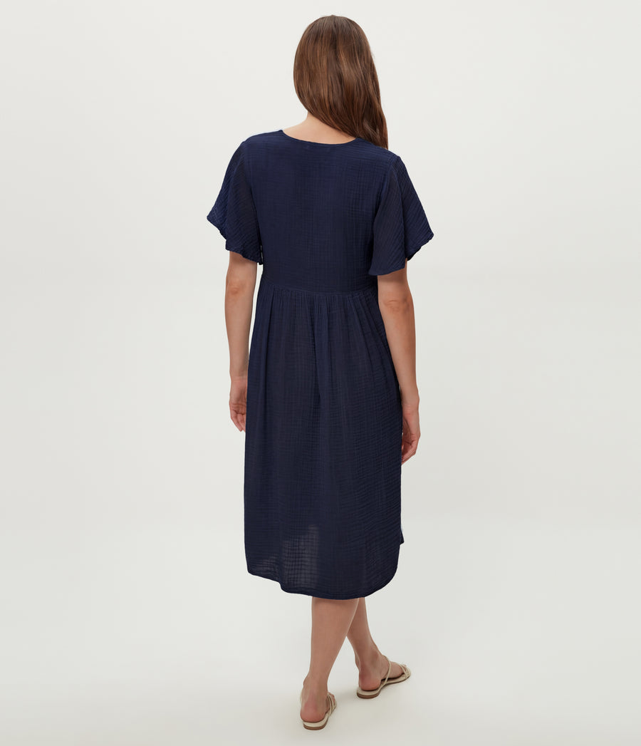Madeline Flutter Sleeve Dress in Nocturnal Blue Back View  #NOCTURNAL