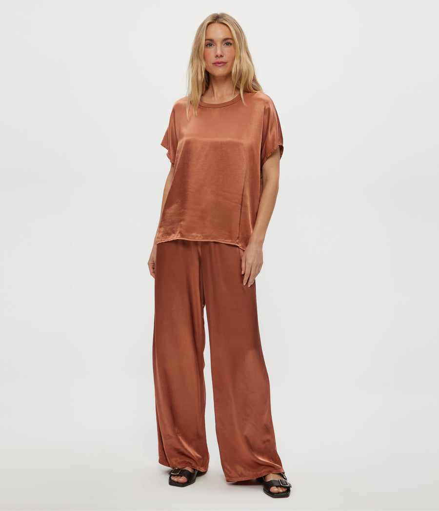 Cyrus Satin Pant in TERRA Orange Close Up View #TERRA
