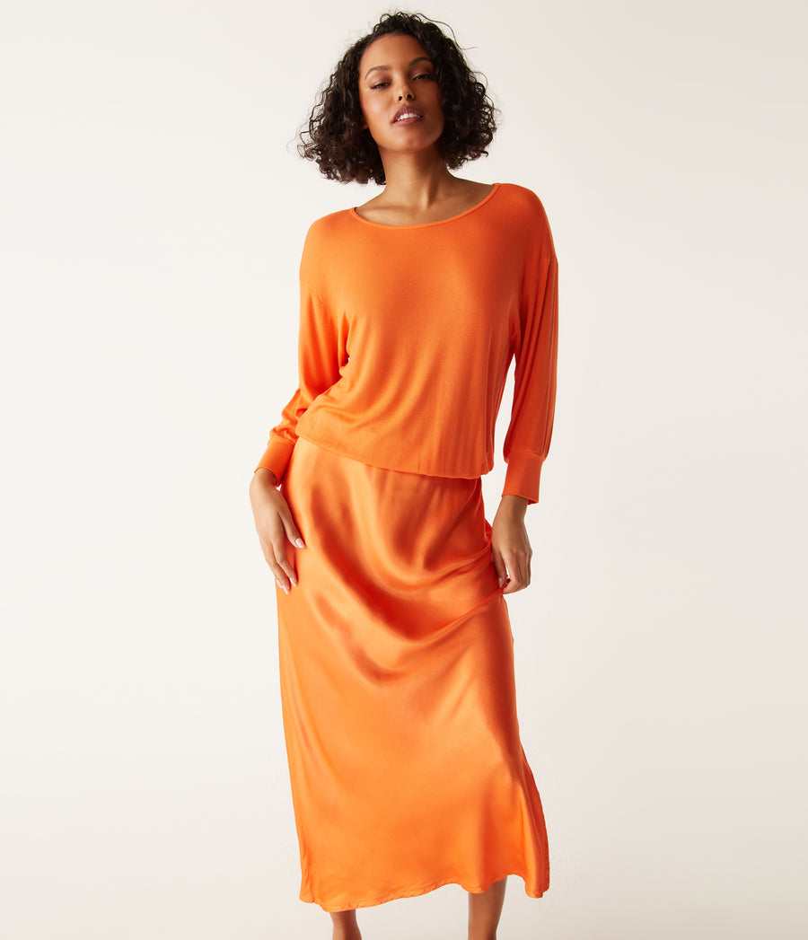 Nadia Mixed Fabric Satin Dress in Heatwave Orange Close Up View #HEATWAVE