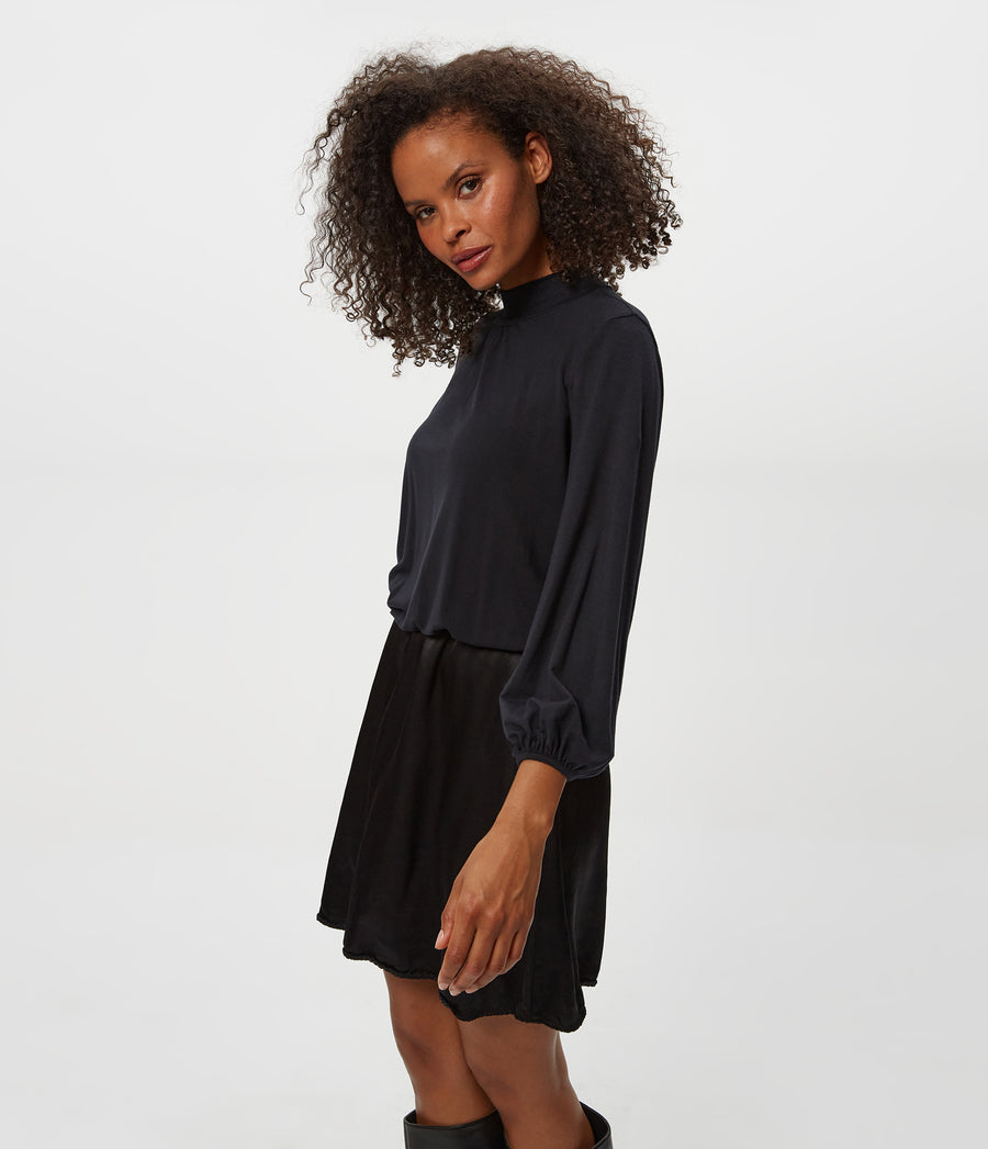 Myla Mixed Fabric Satin Mini Dress in Black Close up View #BLACK