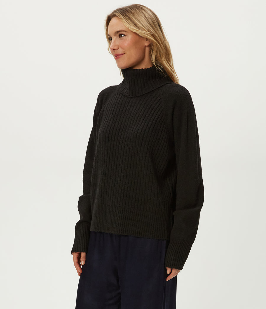 Storm Turtleneck Sweater in Black Side View #BLACK